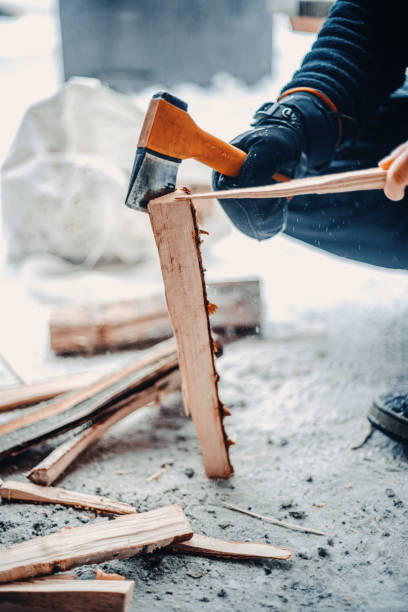 istock Man chopping wood with axe in Rovaniemi, Lapland 2174253379