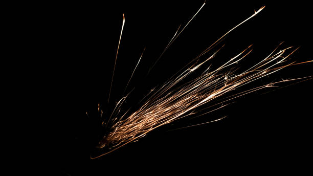 istock sparks from the grinder glowing in the dark 2174254482