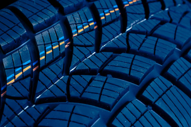istock blue tire tread, tire traces background 2174254515