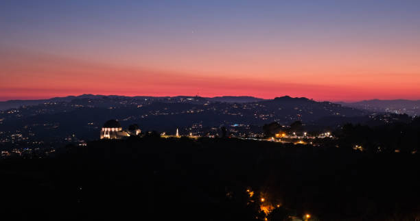 Aerial shot of Griffith Observatory on at twilight in Fall.