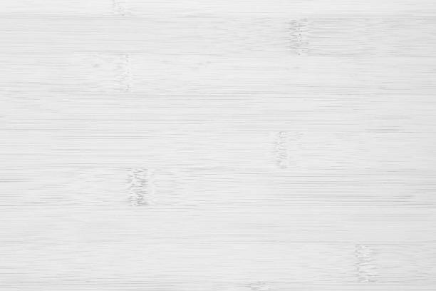 istock White wooden desk texture background, Top view. Abstract top bar table wood bamboo pattern nature. Design wall vintage interior kitchen. Bamboo skin cutting board empty for displaying products. 2174278260