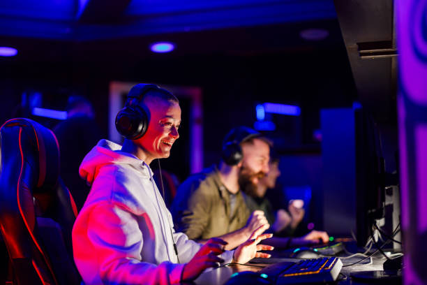 istock A female streamer is playing video games in gaming room. 2174278946