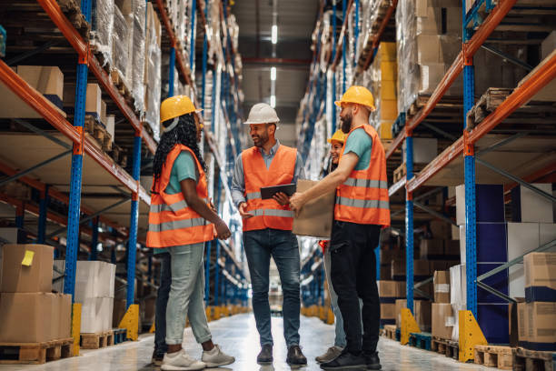 istock Warehouse team consultation for enhancing operations strategy 2174279112