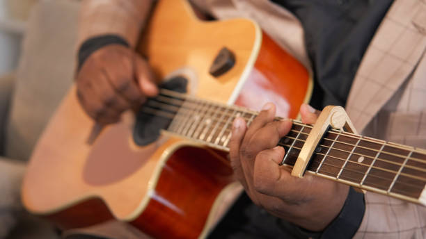 istock Guitar playing song performance man hands chords 2174281358
