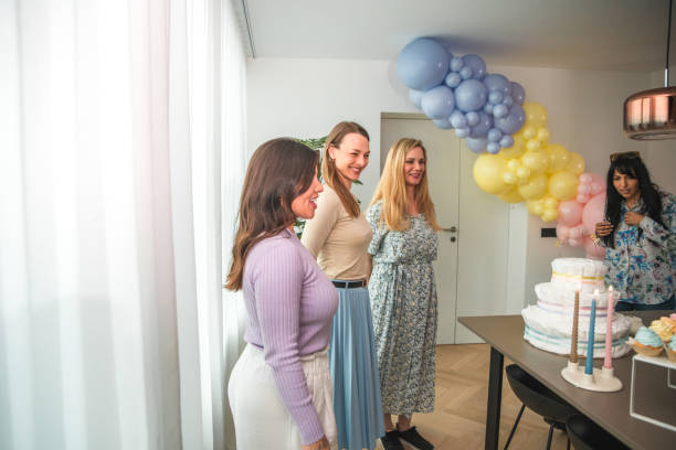 istock Diverse Group Enjoying Baby Shower Festivities 2174281807