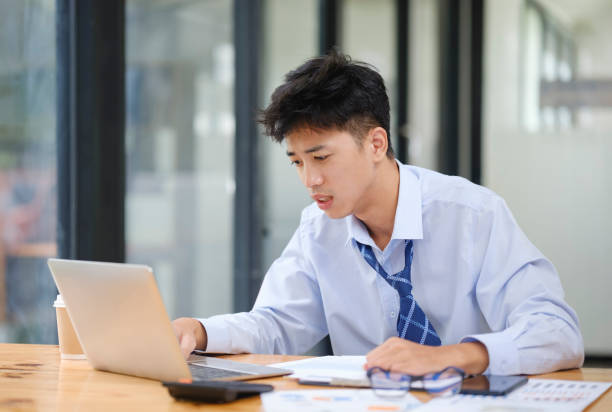 istock Stressed Businessman or Office Worker Facing Overwork and Pressure 2174282166