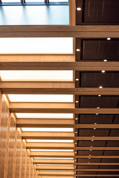 istock Modern ceiling with skylights and lighting equipment in subway, background with copy space 2174282282