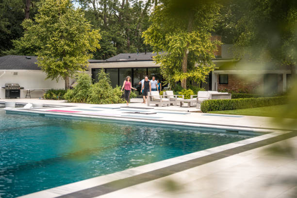 istock Diverse Group Exercising at Poolside Rehab Facility 2174282307