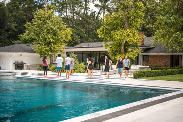 istock Diverse Group Engages in Poolside Rehabilitation Exercise 2174282316