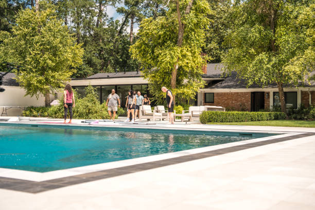 istock Diverse Group Engages in Poolside Rehab Fitness 2174282345