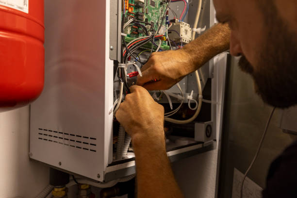 istock An unrecognizable electrician installs the heating pump. They can bring huge savings 2174285476