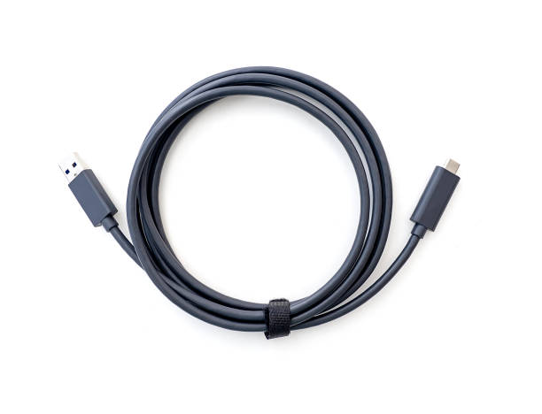 Twisted cable with standard USB and USB-C Type-C plugs isolated on white
