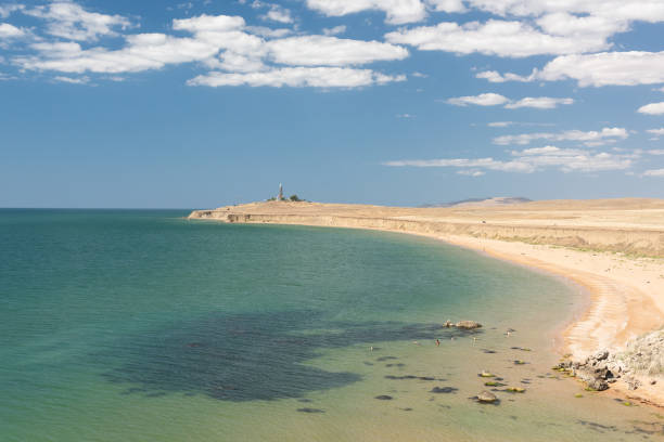 istock A sandy beach on the Black Sea and a lighthouse 2174294691