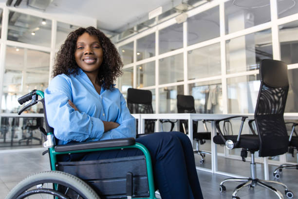 istock Paralyzed woman professional worker working in office 2174298391