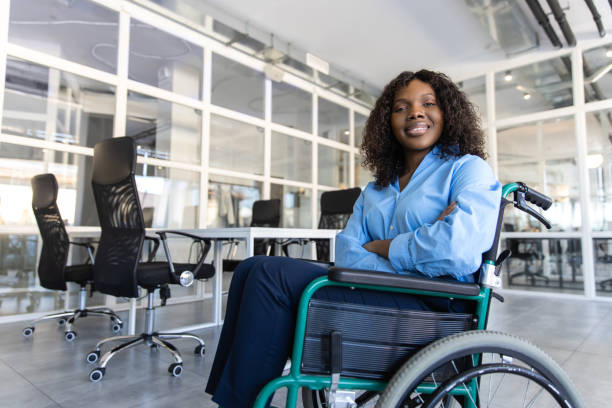 istock Paralyzed woman professional worker working in office 2174298395
