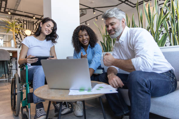 istock Businessman and managers working together on laptop integrating technology 2174298444