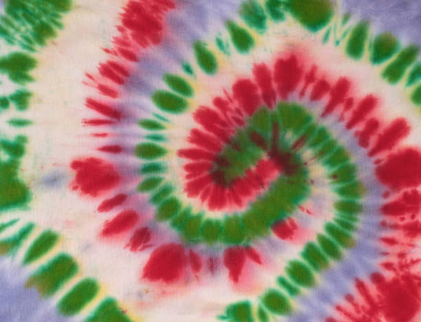 istock Colorful Spiral Tie-Dye Pattern with Red, Green, and Purple Swirls 2174302949