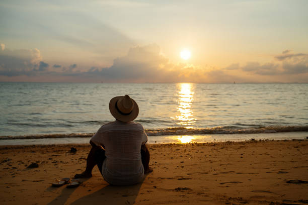 istock Mid adult man enjoying the sunset 2174309560