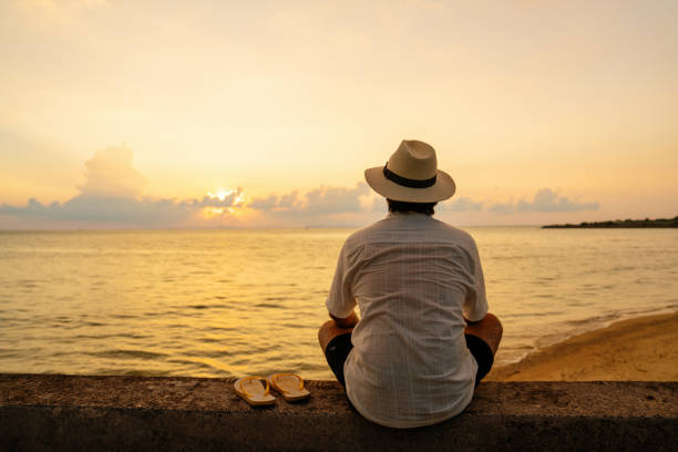 istock Mid adult man enjoying the sunset 2174309572