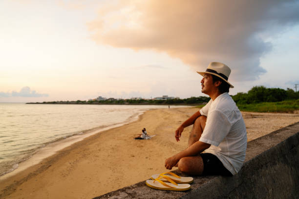istock Mid adult man enjoying the sunset 2174309576