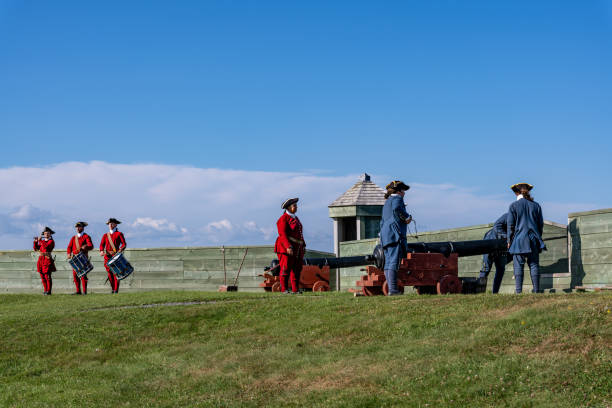 Louisbourg, Nova Scotia, Canada - August 27, 2024: Cannon loading demonstration at Fortress of Louisbourg, a reconstructed French colonial town and fortress from 18th century