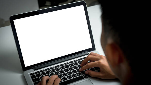 istock Mockup laptop computer. hand man work using laptop with white background for advertising,contact business search information on desk at coffee shop.marketing and creative design 2174313830