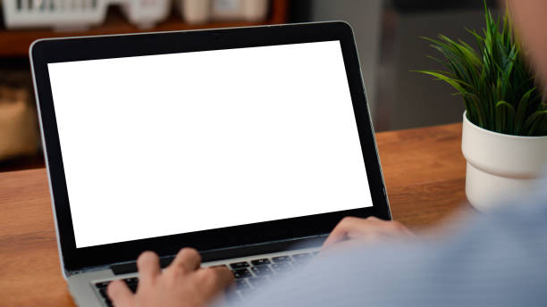istock Mockup laptop computer. hand man work using laptop with white background for advertising,contact business search information on desk at coffee shop.marketing and creative design 2174313833