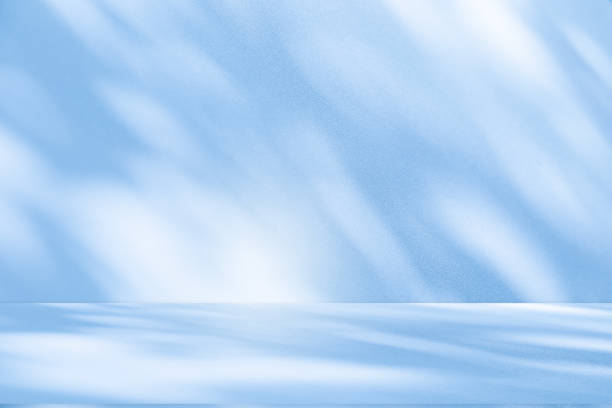 istock Studio style background wall decoration presentation uses white and blue tones. with shadows cast from a nearby window, concept creating a decorative 2174317413