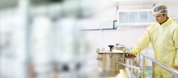 istock Quality control supervisor checking and collecting food and beverage producing data. 2174317826