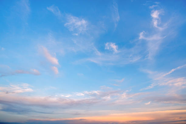 istock Panoramic view of clear blue sky and clouds, Blue sky background with tiny clouds. White fluffy clouds in the blue sky. Captivating stock photo featuring the mesmerizing beauty of the sky and clouds. 2174317939