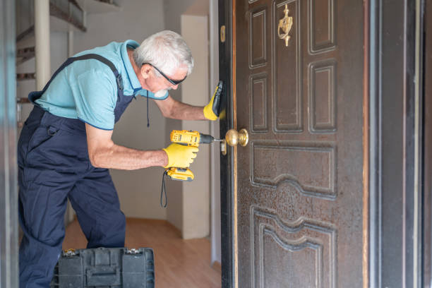 istock Locksmith Changing Door Locks In A House Entrance 2174323802
