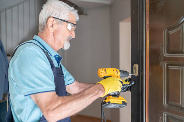 istock Locksmith Changing Door Locks In A House Entrance 2174323855