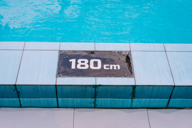istock Crystal-clear water in a swimming pool, reflecting a pristine and inviting atmosphere for relaxation 2174329786