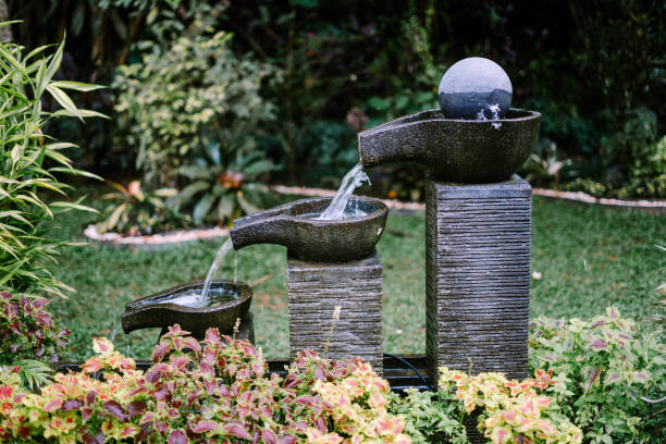 A decorative fountain gracefully streams water, adding an elegant