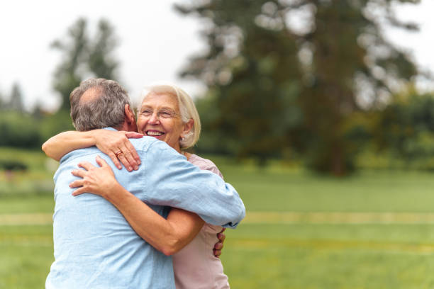 istock Aging Gracefully: Senior Couple's Tender Embrace in Park 2174331192