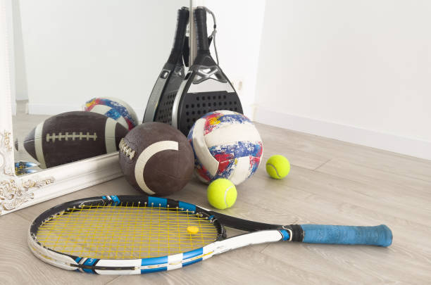 istock different modern sport equipment near beige wall 2174334471