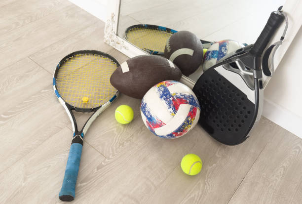istock different modern sport equipment near beige wall 2174334515