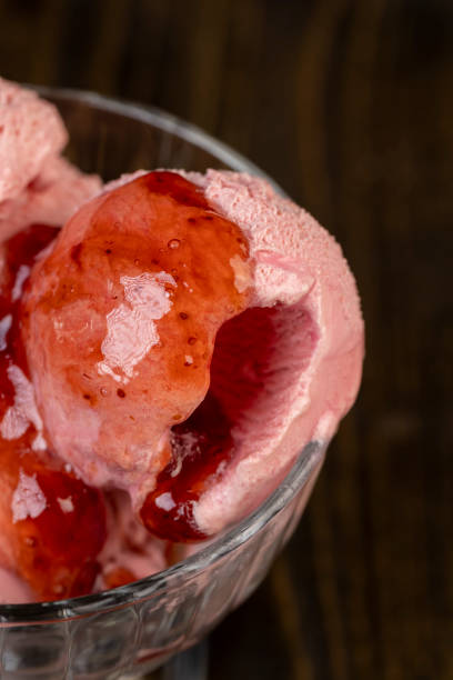 istock red strawberry-flavored ice cream in a glass bowl 2174335254