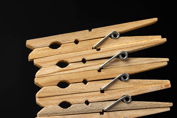 wooden clothespins on the table, wooden clothespins for drying clothes, closeup