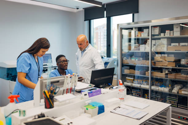 istock A multi-ethnic group of biochemists work on a computer in a laboratory. They discuss the results of the obtained biochemical analyses 2174335941