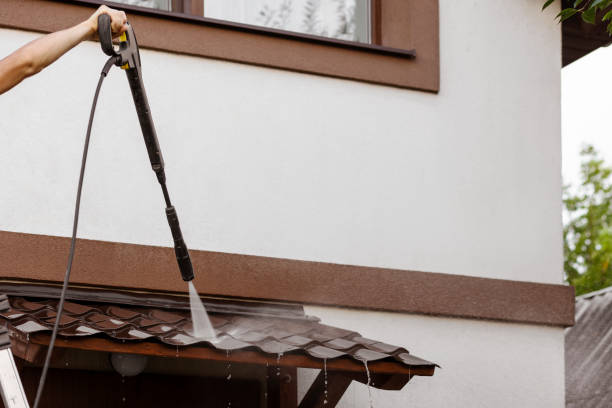 istock Cleaning Roof with Pressure Washer 2174339613
