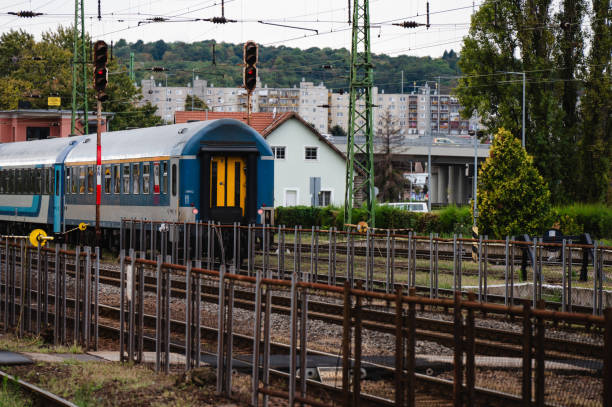 istock Modern passenger train on a curved railway track 2174341762