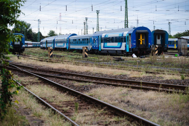 istock Modern passenger train on a curved railway track 2174341781