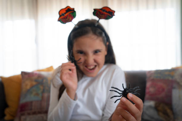 istock Children playing with Halloween decoration 2174342638