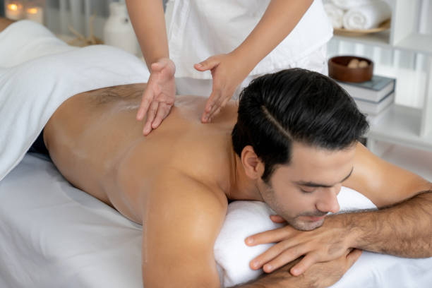 istock Caucasian man customer enjoying relaxing anti-stress massage. Quiescent 2174346892