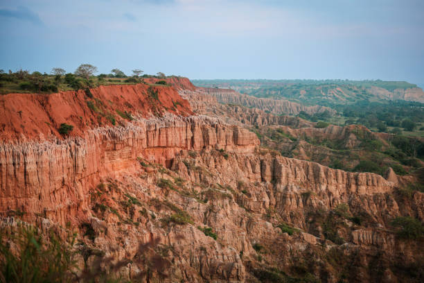 istock Explore the stunning red cliffs of Angola as they rise dramatically against a clear sky in the late afternoon sunlight 2174350455
