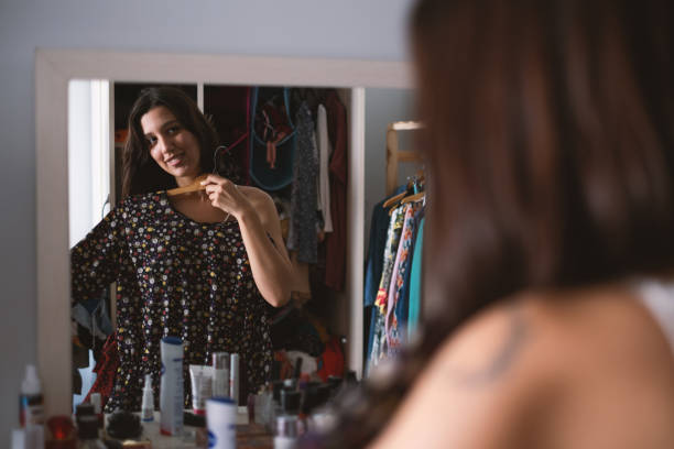 istock Trying on Dress in Front of the Mirror 2174352138