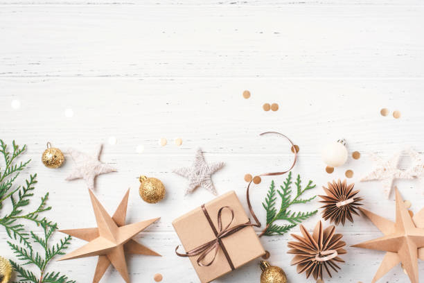 istock Festive Christmas background with gift box and Christmas decorations 2174352665