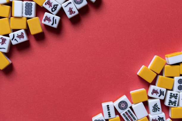 istock Mahjong tiles background on red background 2174359513