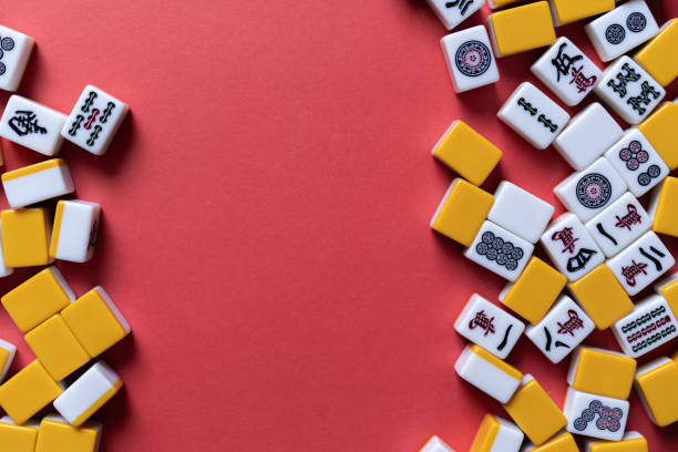 istock Mahjong tiles background on red background 2174359535